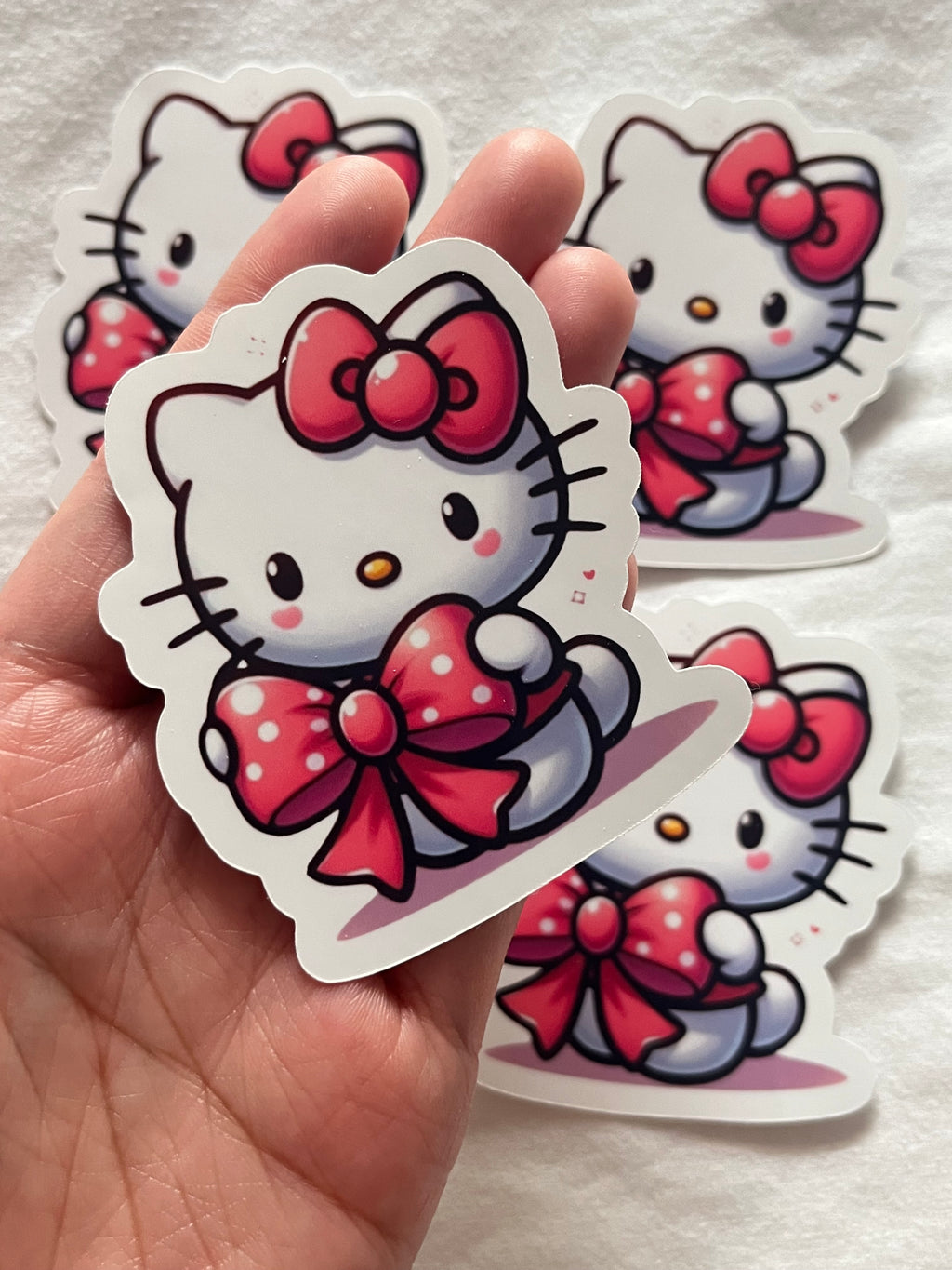 Hello Kitty Holding Bow Sticker